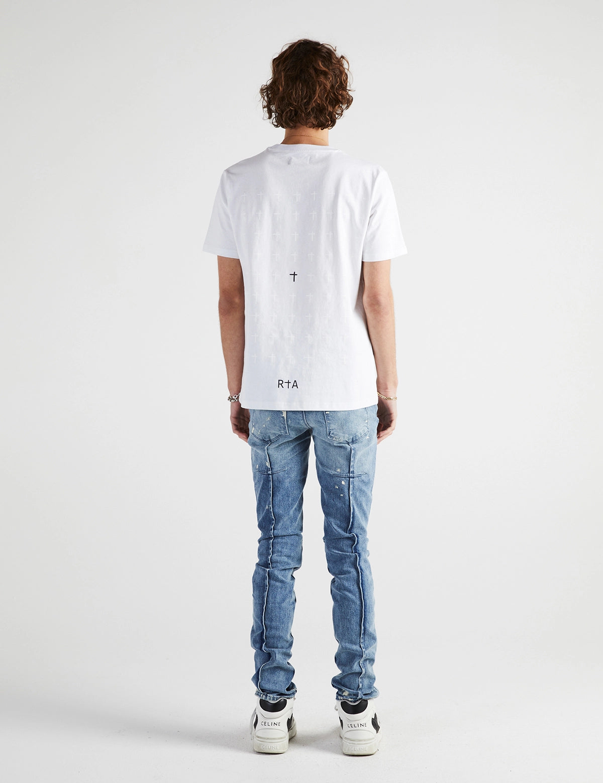 Light Blue Clayton Skinny Jeans with Cross Details - Full Back View On Model | RTA