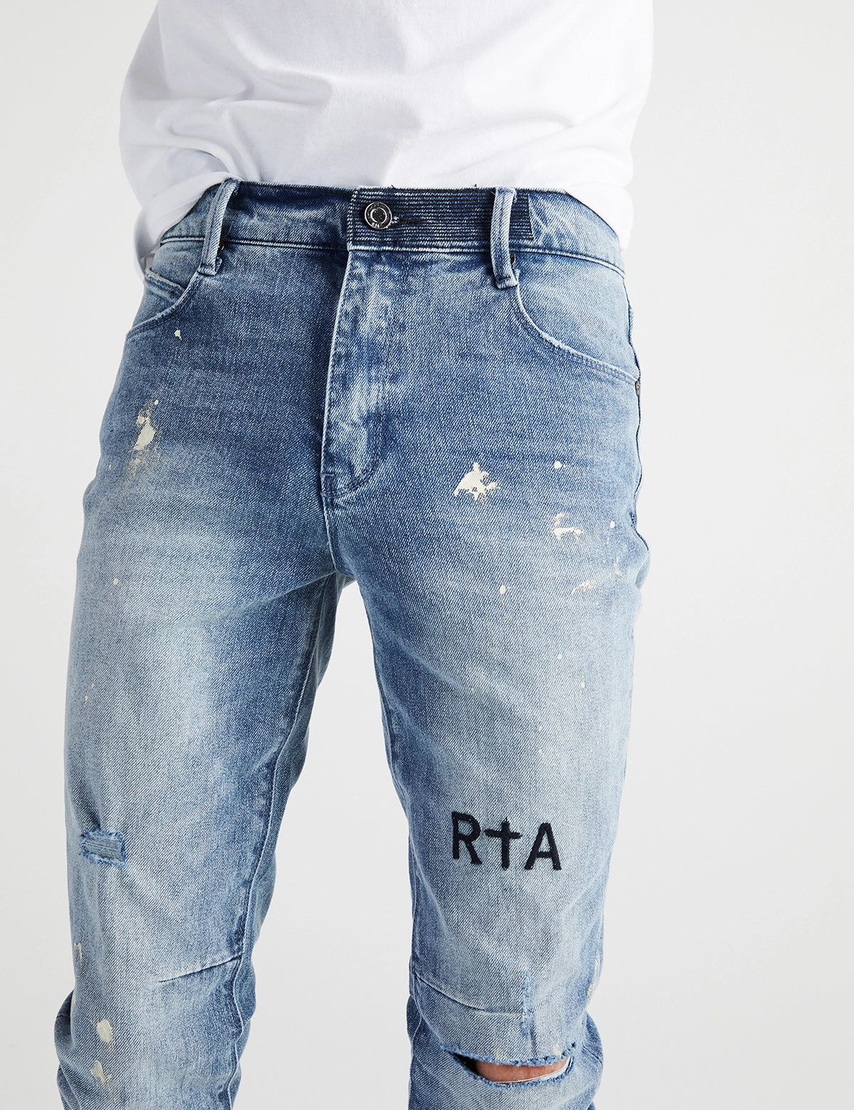 Distressed Denim with White Paint Splatter - Front Waist Detail Close-up | RTA