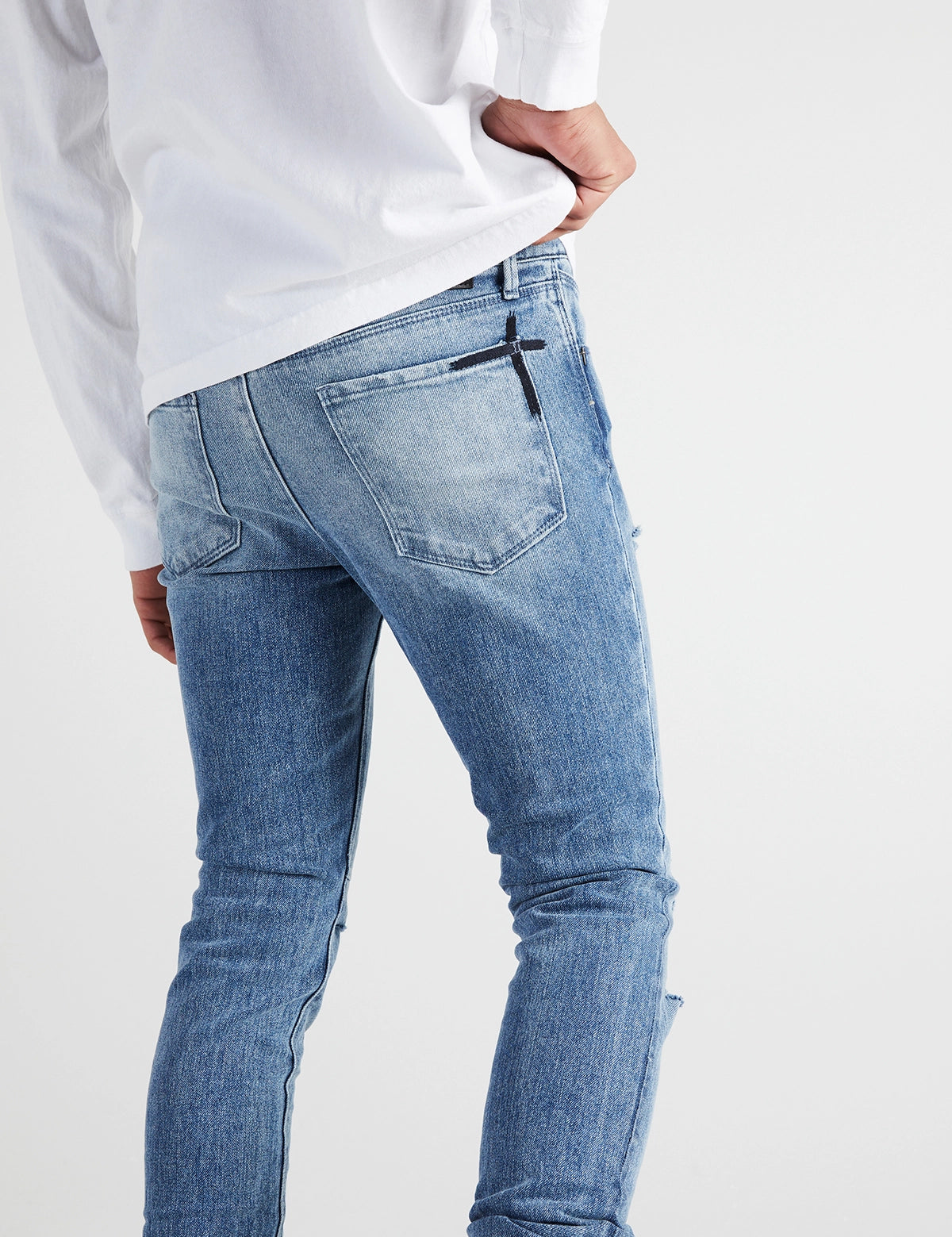Vintage Blue Distressed Bryant Skinny Jeans - On Model Back View | RTA