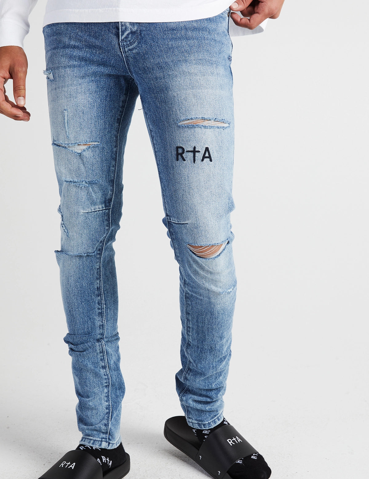 Vintage Blue Distressed Bryant Skinny Jeans - On Model Front View | RTA