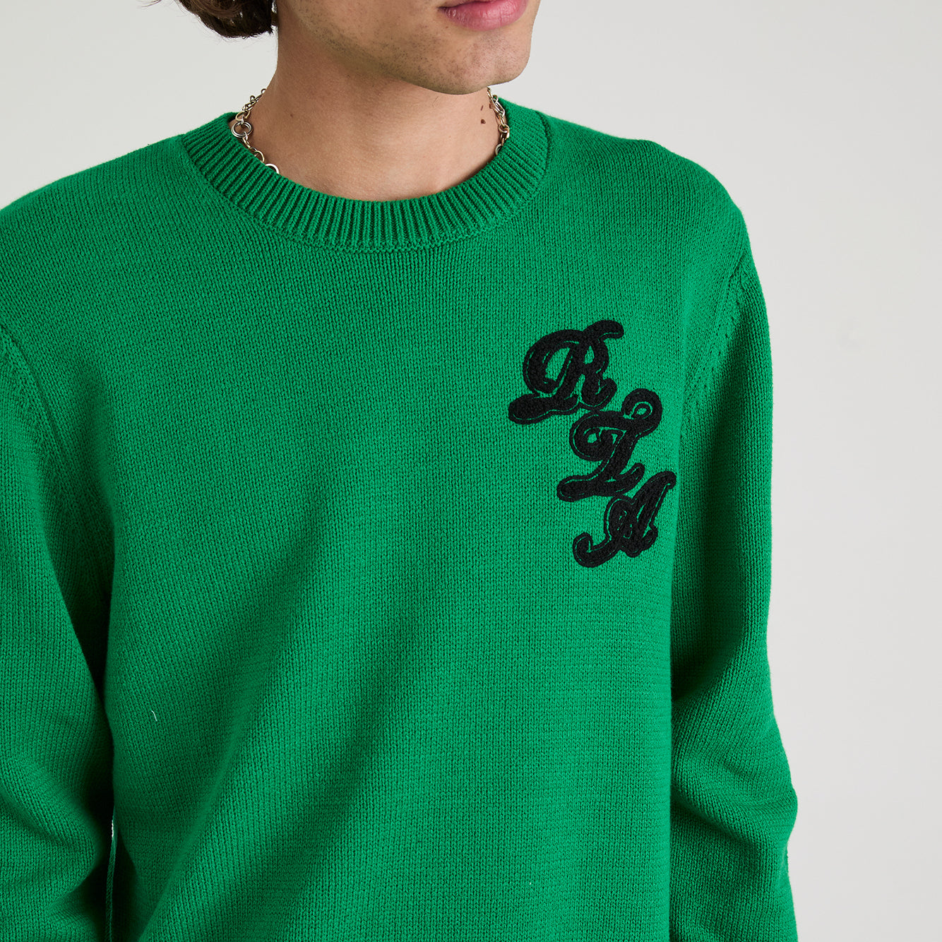 Green Knit Ethan Sweater with Script Logo - Close-Up Front Detail | RTA