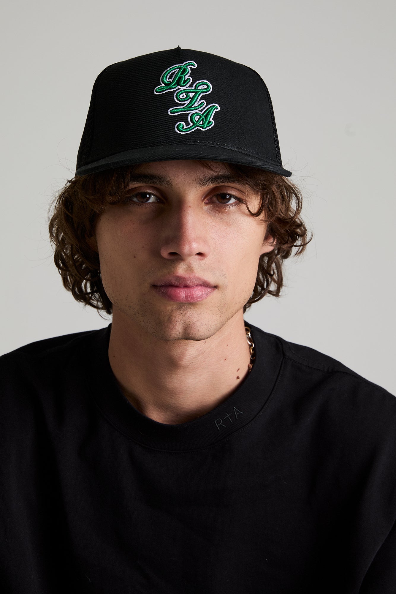 GIDEON TRUCKER HAT | BLACK GREEN SCRIPT LOGO