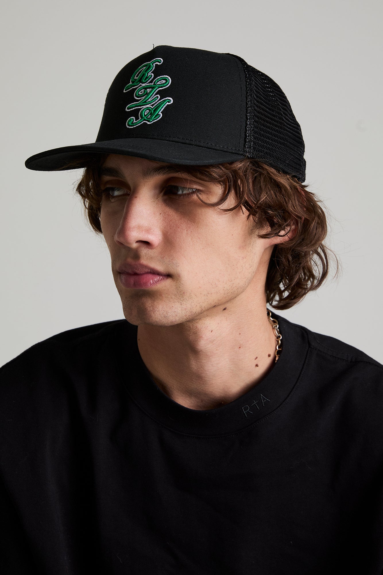 GIDEON TRUCKER HAT | BLACK GREEN SCRIPT LOGO