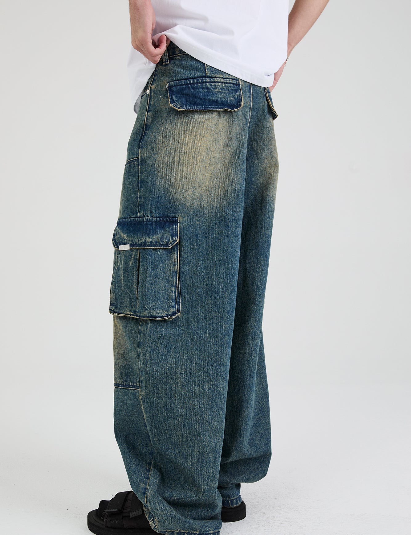 Blue Mineral Baggy Cargo Jeans - Side Detail On Model | RTA
