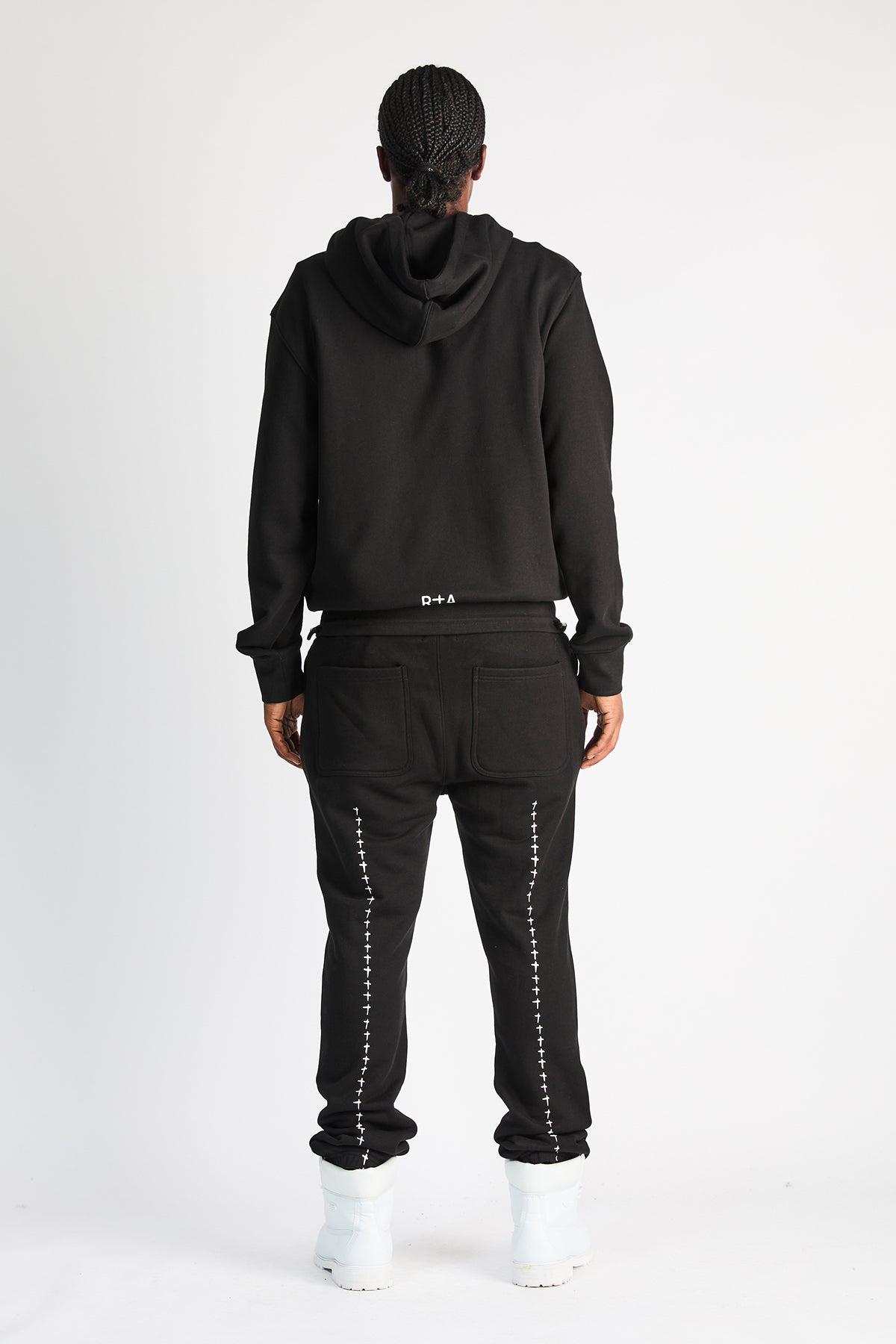 Black Owen Sweatpants with Cross Details on Model - Back Styled Look | RTA