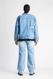 Glacier Blue Distressed Denim Jeans with 3D Cross Details - Male Model Back View | RTA
