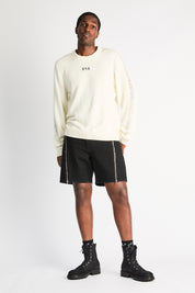 Black Denim Caleb Shorts with Sweater - On Model Front | RTA