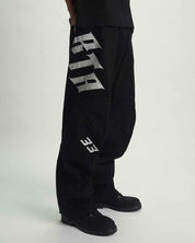 Black Alwin Moto Jean - Side Detail, Old English Graphic and Moto Knee Panel | RTA