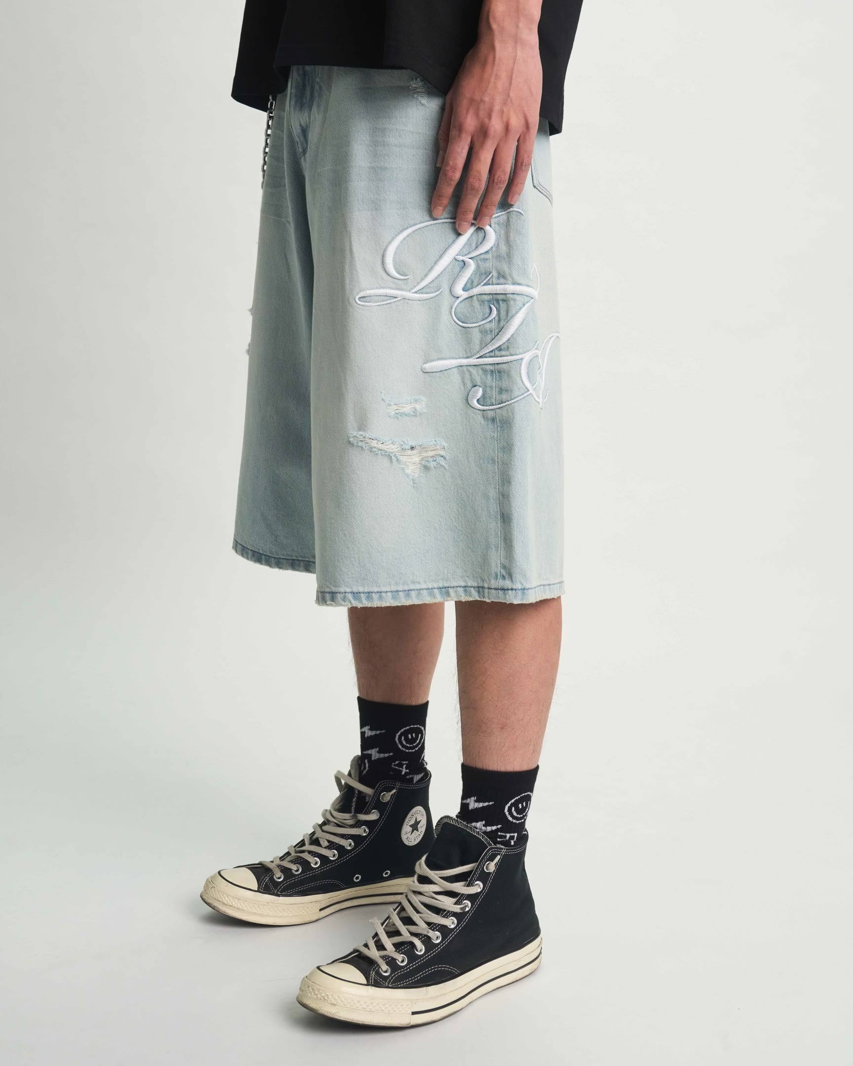 Light Blue Designer Denim Shorts with Cursive Logo - Side Styling Detail | RTA
