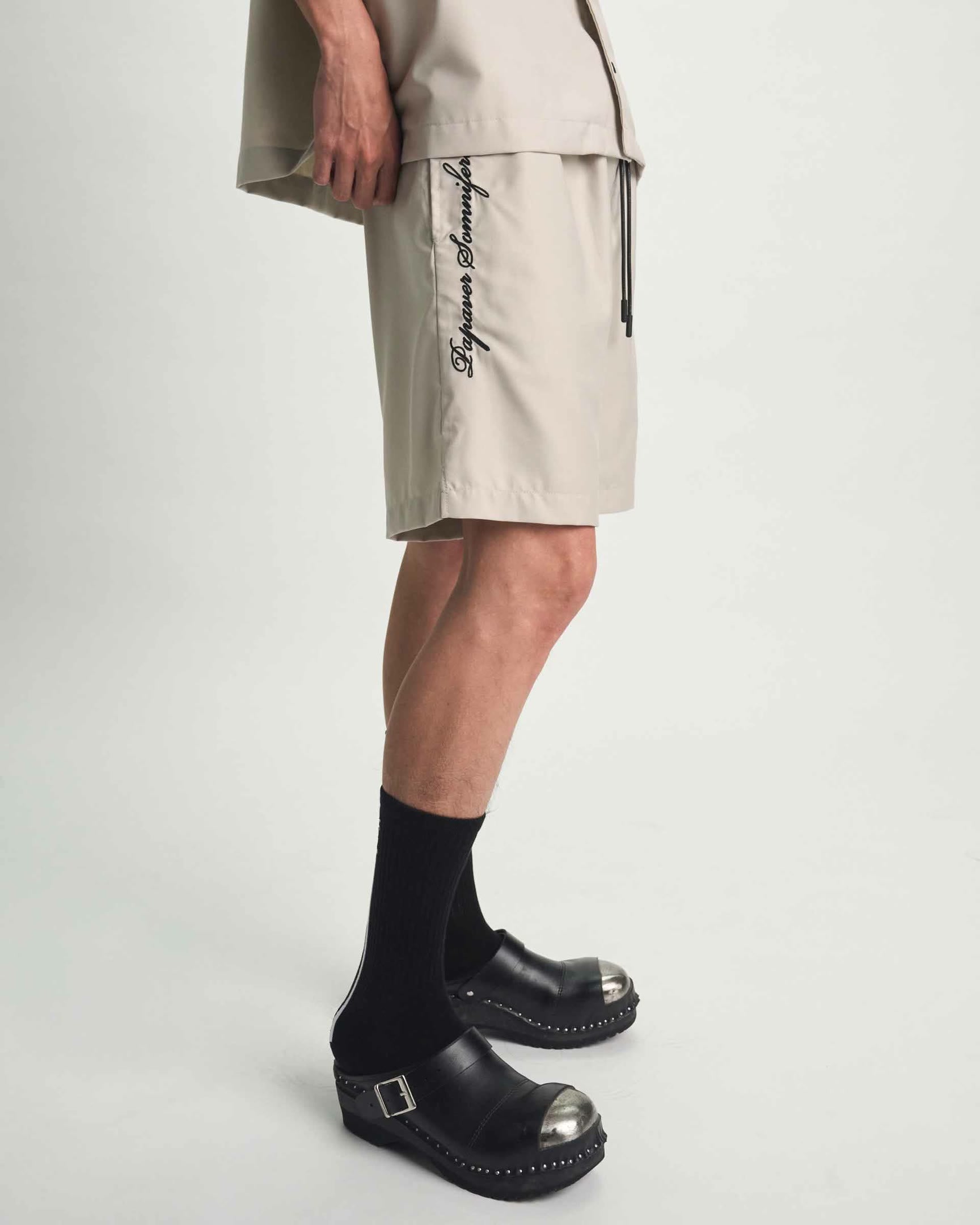 Beige CLYDE Shorts Side Detail - Typography Embroidery | RTA