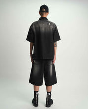 Gustavo Fray Noir Distressed Denim Short On Model Styled Look - Back View | RTA