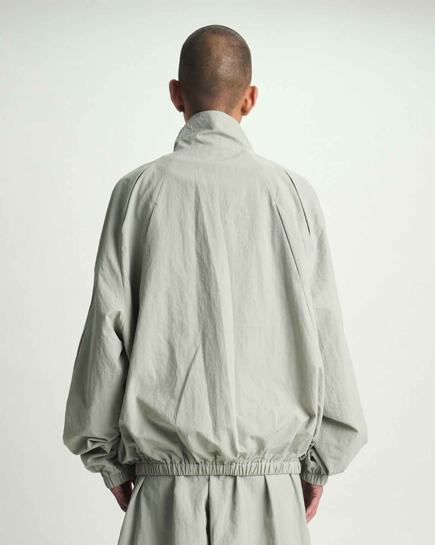 Smoke Grey Nylon Eero Parachute Jacket - On Model Back View, Oversized Fit | RTA