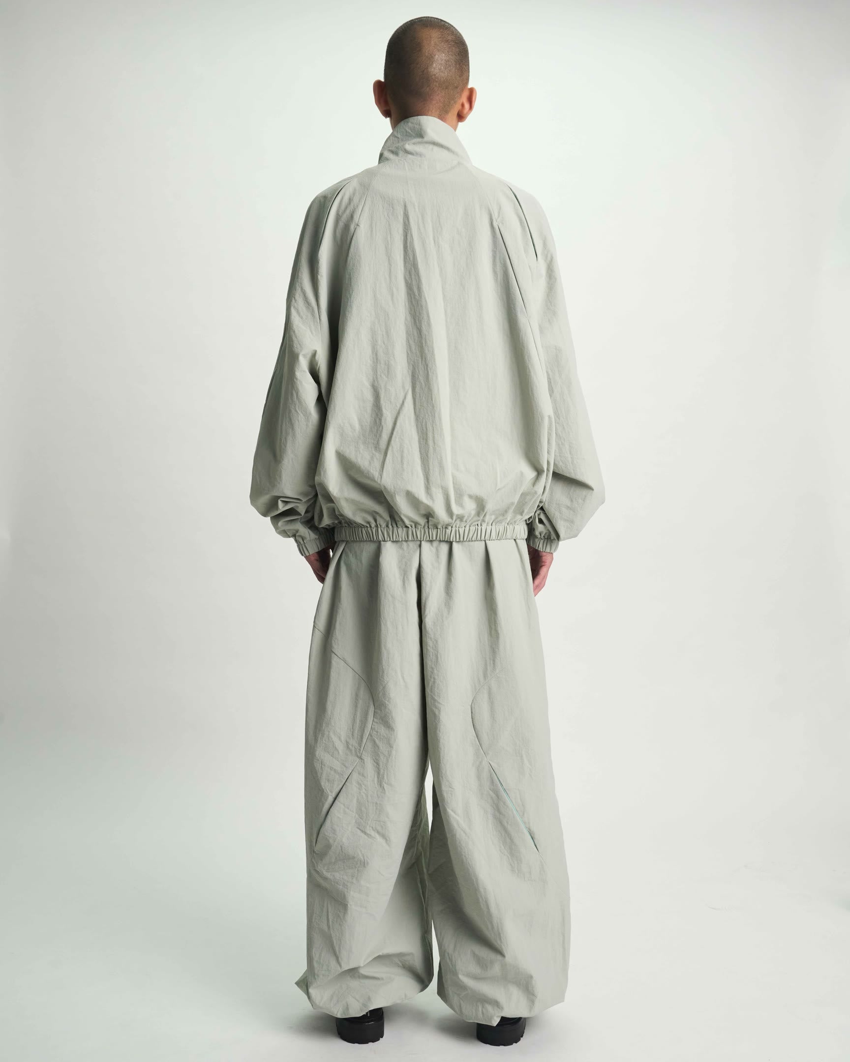 Smoke Grey Nylon Streetwear Parachute Pant - On Model Back, Styled Look | RTA