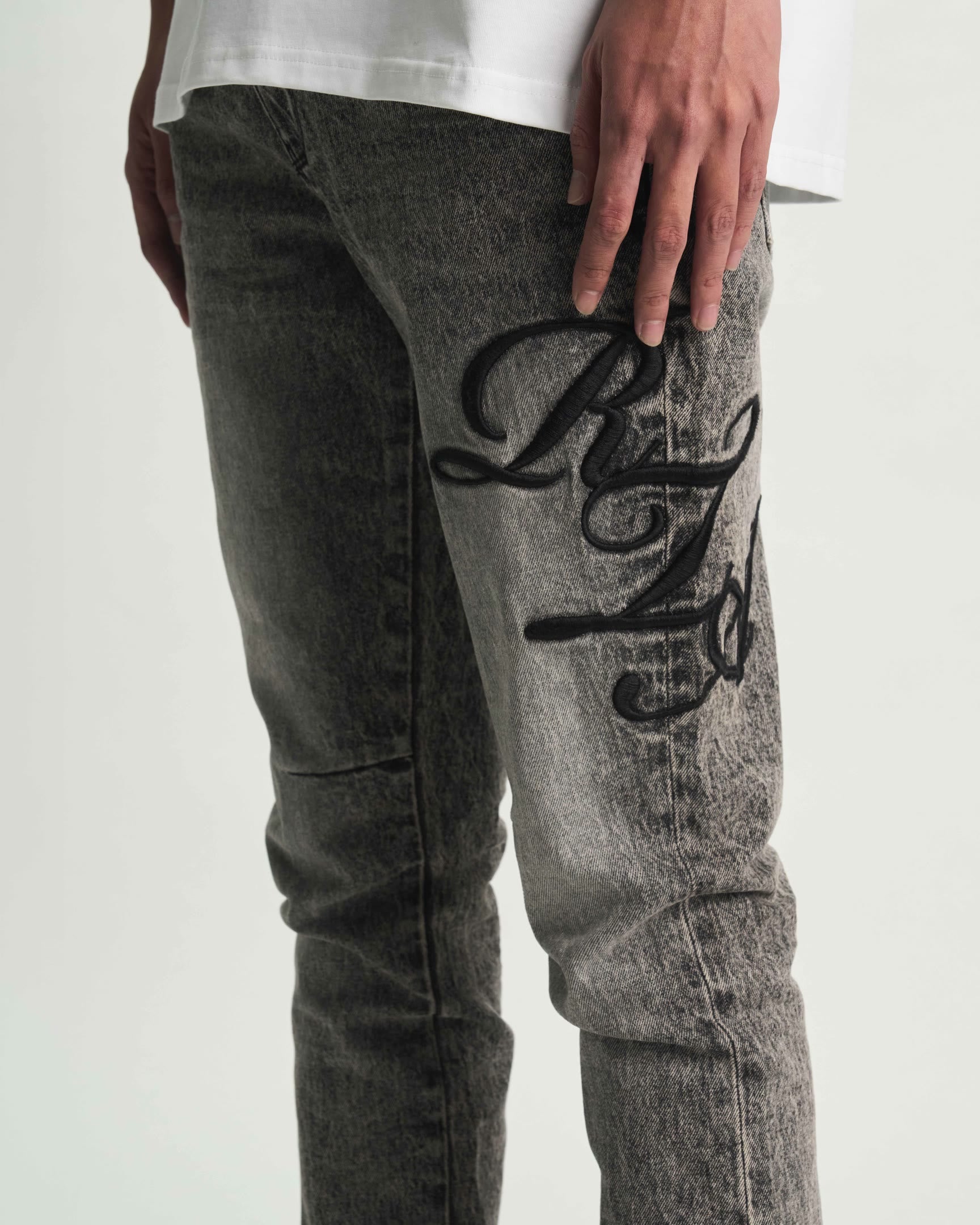Grey Stone Haze Cursive Jeans On Model - Side Typography Detail | RTA