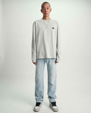 Light Blue Distressed Slim Jeans - On Model Full Length Front View | RTA