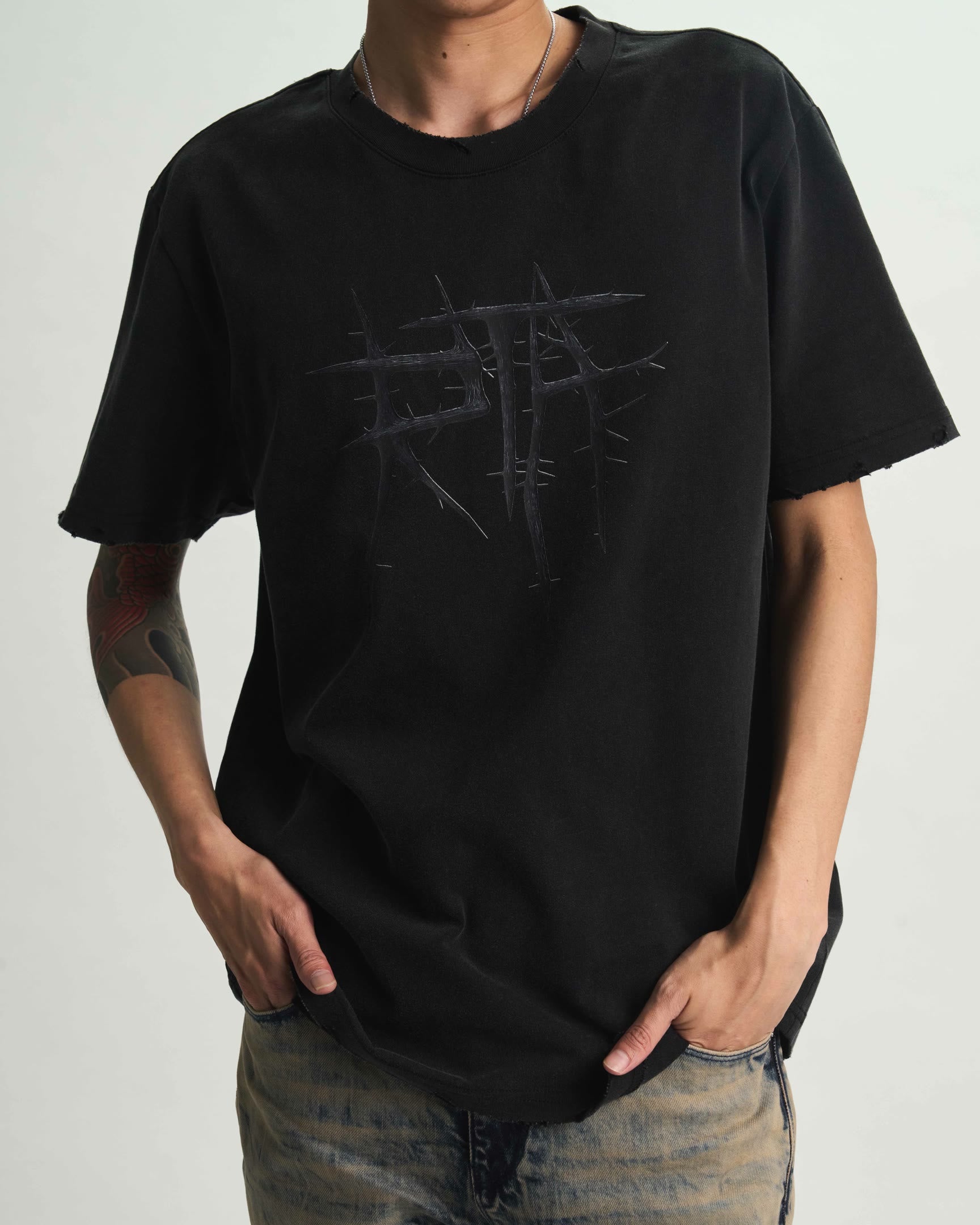Black Cotton Liam Tee - On Model Torso, Thorn Graphic Detail, Distressed Neckline | RTA