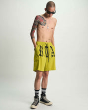 Citron Miguel Swim Trunk with Old English RTA Print - On Model Front | RTA