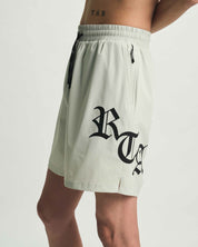 Light Teal Swim Trunk Side Detail with Gothic RTA Lettering | RTA