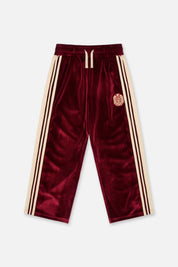 Burgundy Velvet Kids Wide Leg Sweatpants - Front View, Crest Embroidery & Cream Side Stripe | RTA