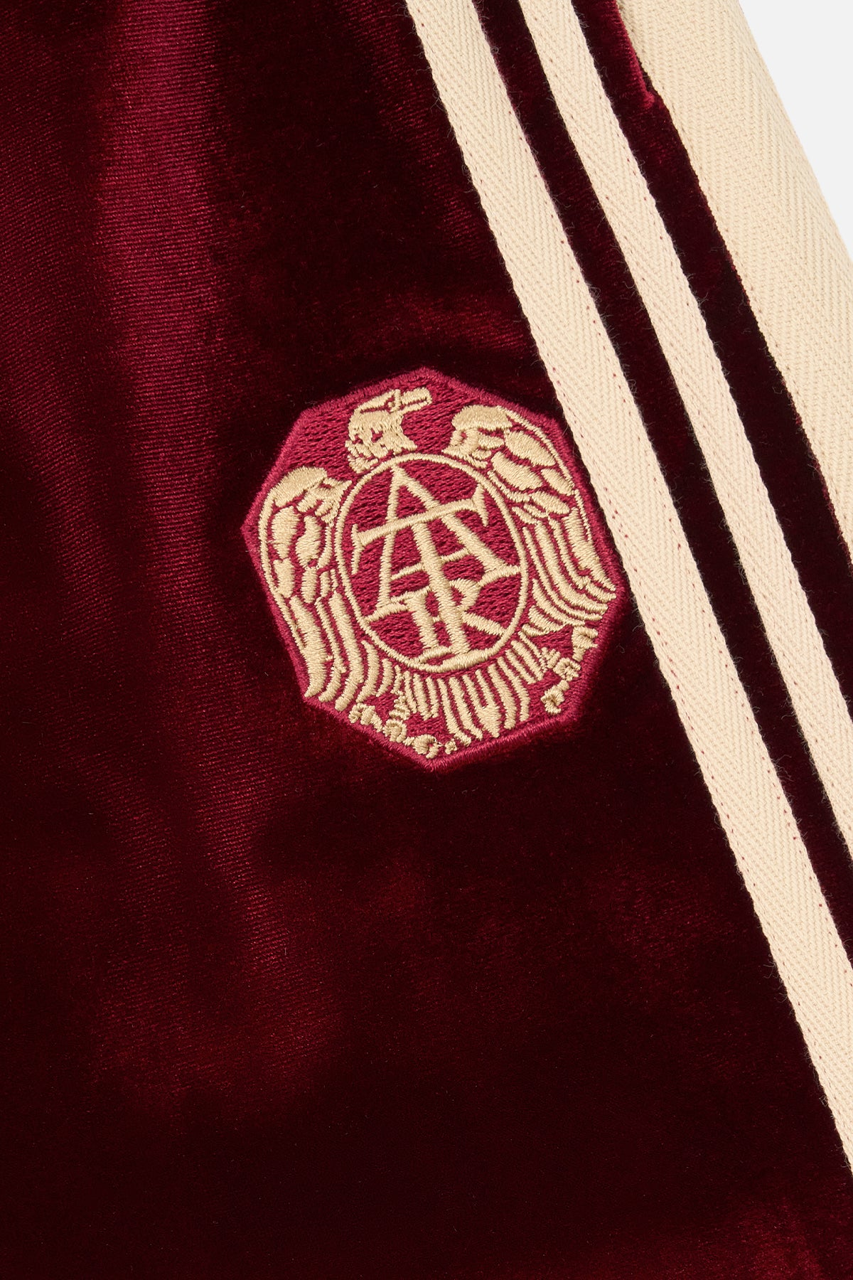 Burgundy Kids Sweatpants - RTA Signature Crest Embroidery Close-Up on Velvet | RTA