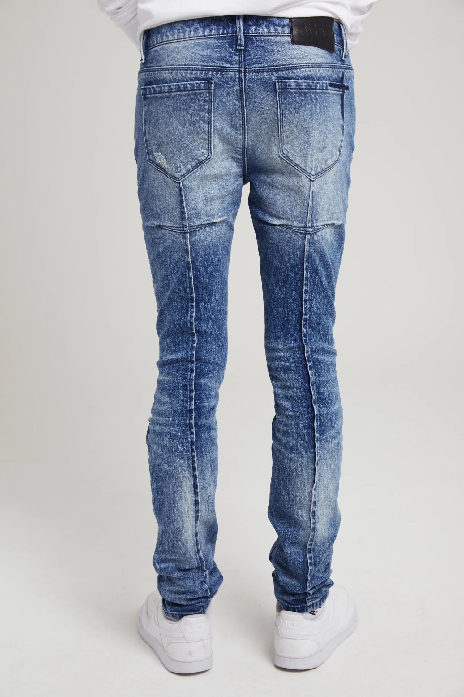 CLAYTON SKINNY JEAN | MEDIUM WASH DISTRESSED