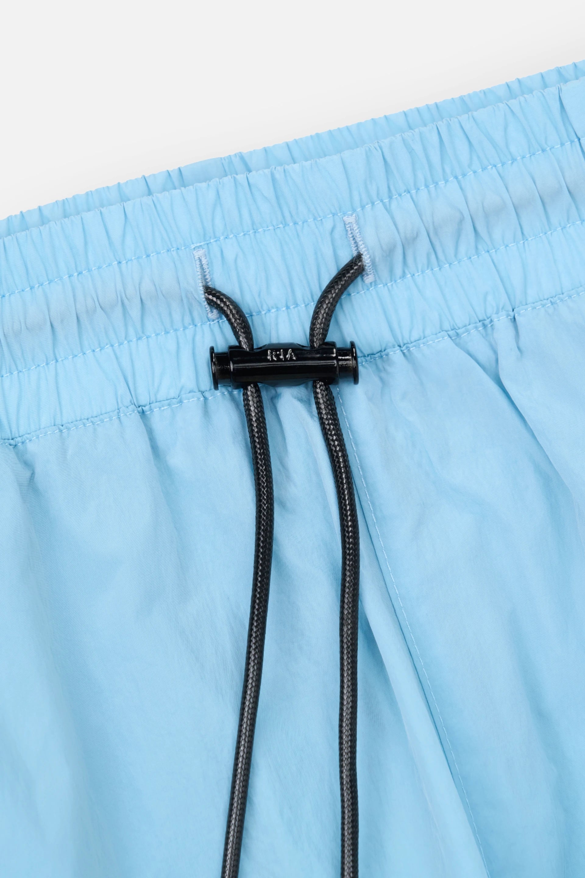 CLYDE SWIM SHORT | LIGHT BLUE COLLEGIATE