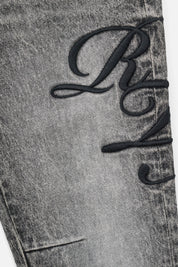 Stone Haze Grey Denim Bryant Jeans - Cursive Typography Detail Close-Up | RTA