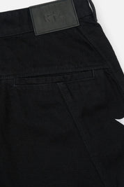 Black Alwin Moto Jean - Back Waistband Close-Up, Leather Patch and Pocket Detail | RTA