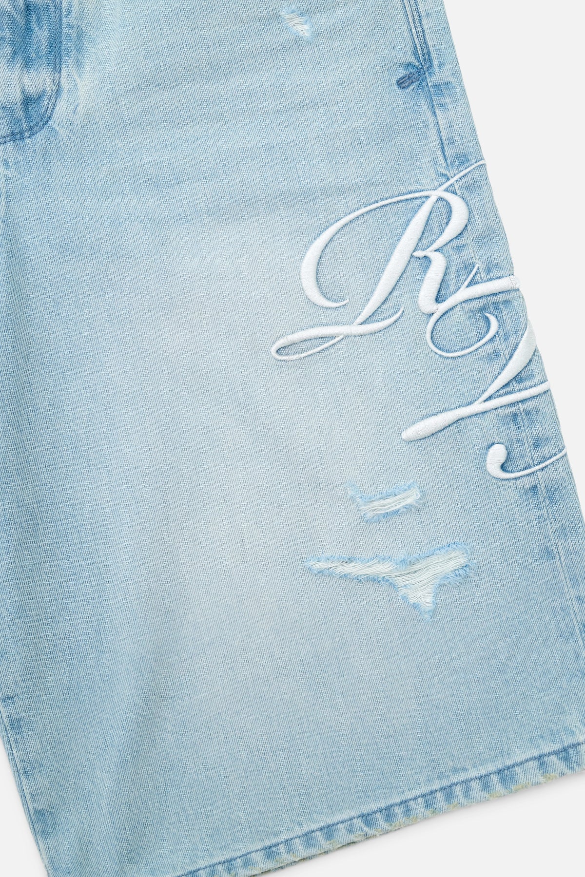 Soft Horizon Denim Shorts with Cursive Logo Detail - Close Up | RTA