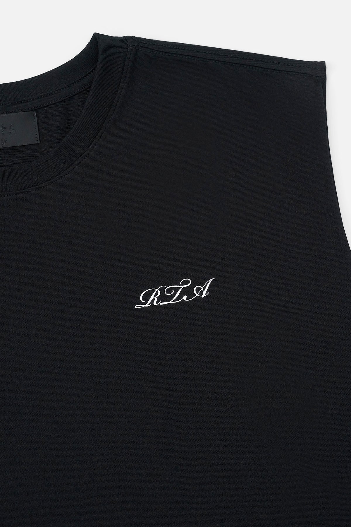Black Terry Muscle Tee - Cursive Logo Detail Close-Up | RTA