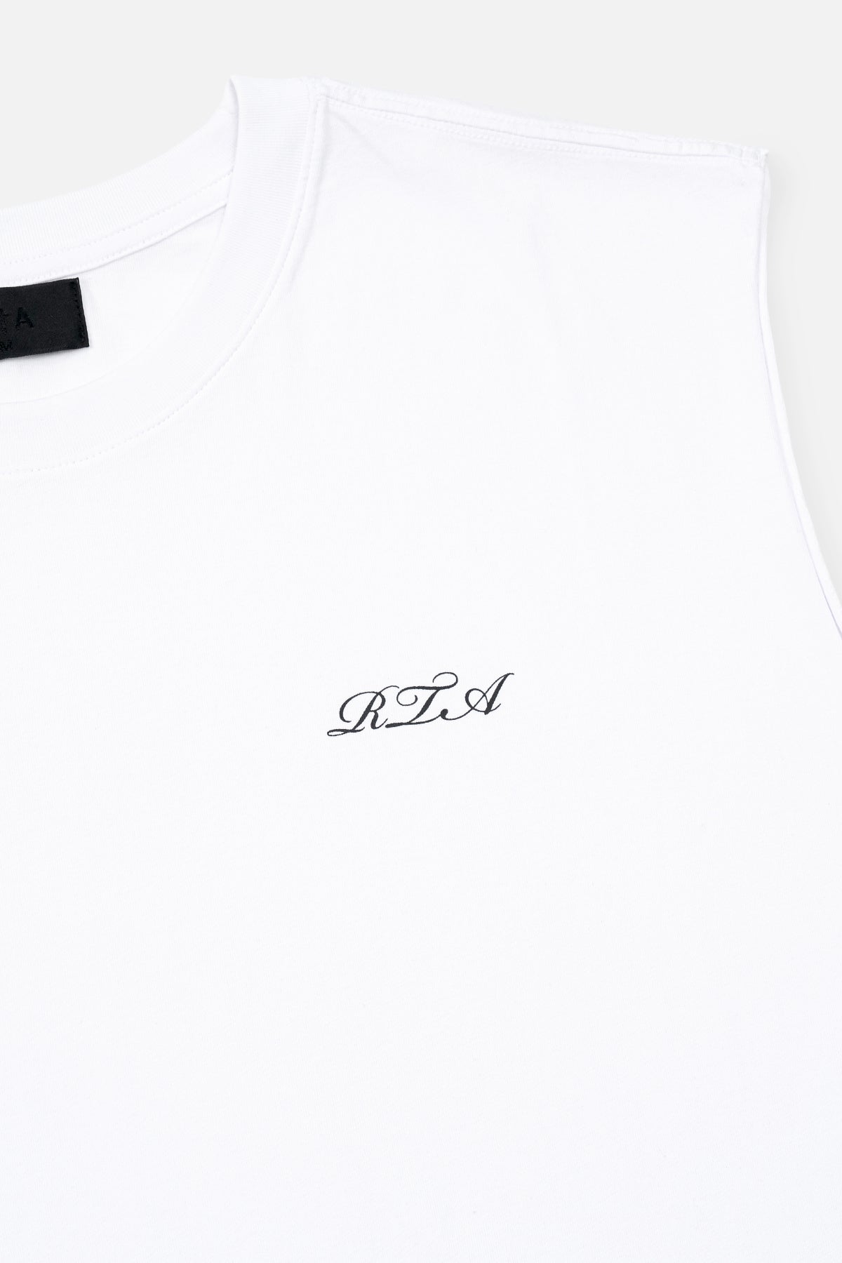 White Cotton Terry Muscle Tee - Cursive Logo Detail Close-Up | RTA