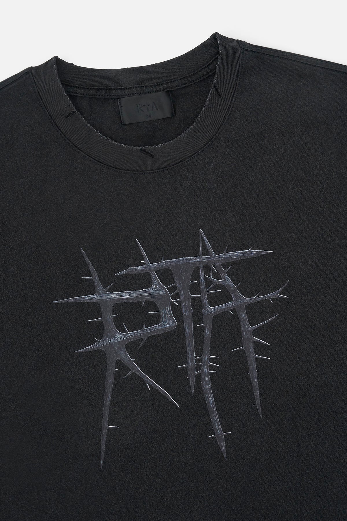Black RTA Thorn Tee - Close-Up Neckline Label and Graphic Detail | RTA