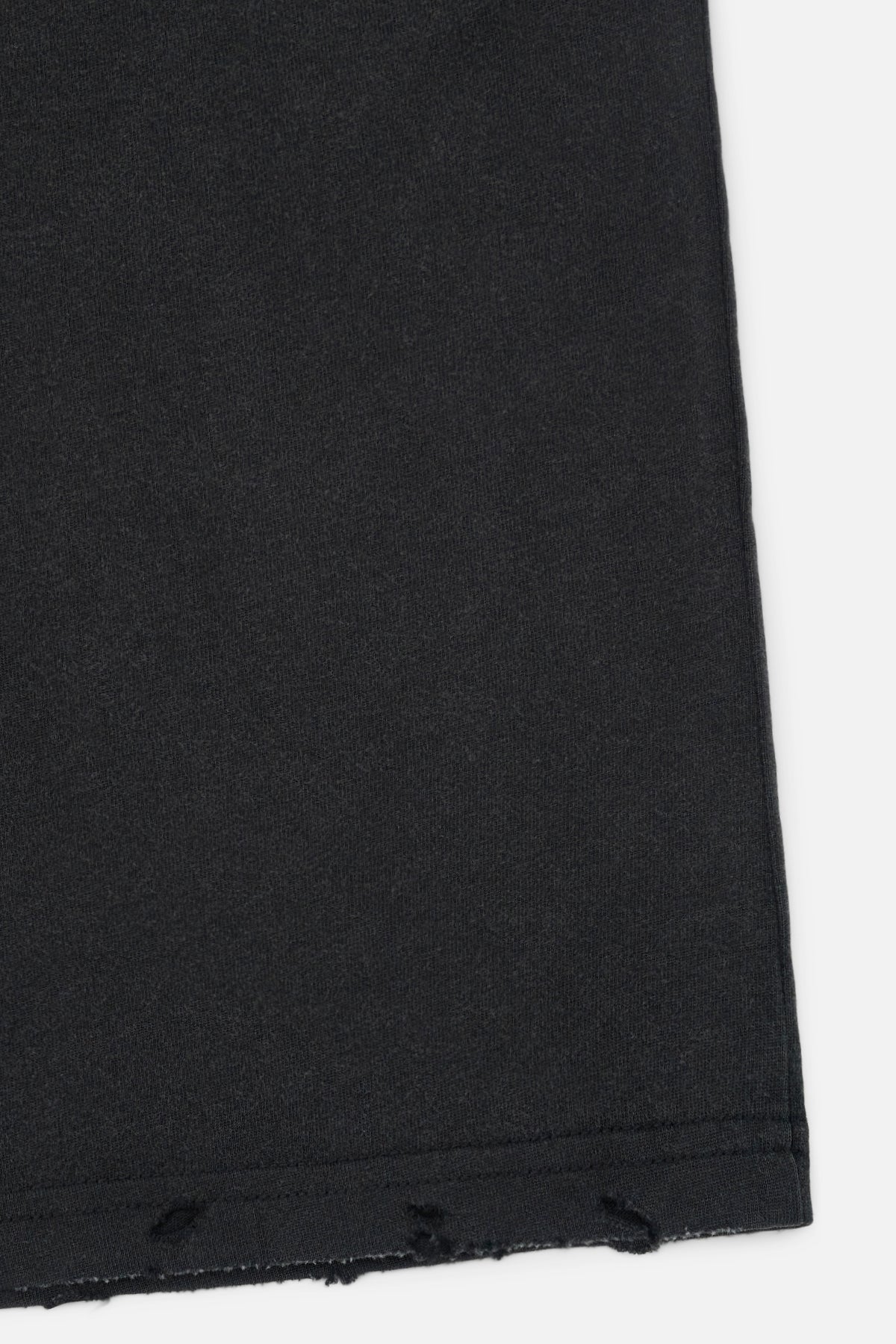 Black Luxury Streetwear Tee - Distressed Hem Close-Up, Cotton Fabric Texture | RTA