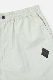 Zaid Parachute Pant Waistband and Logo Patch Close-Up Detail | RTA