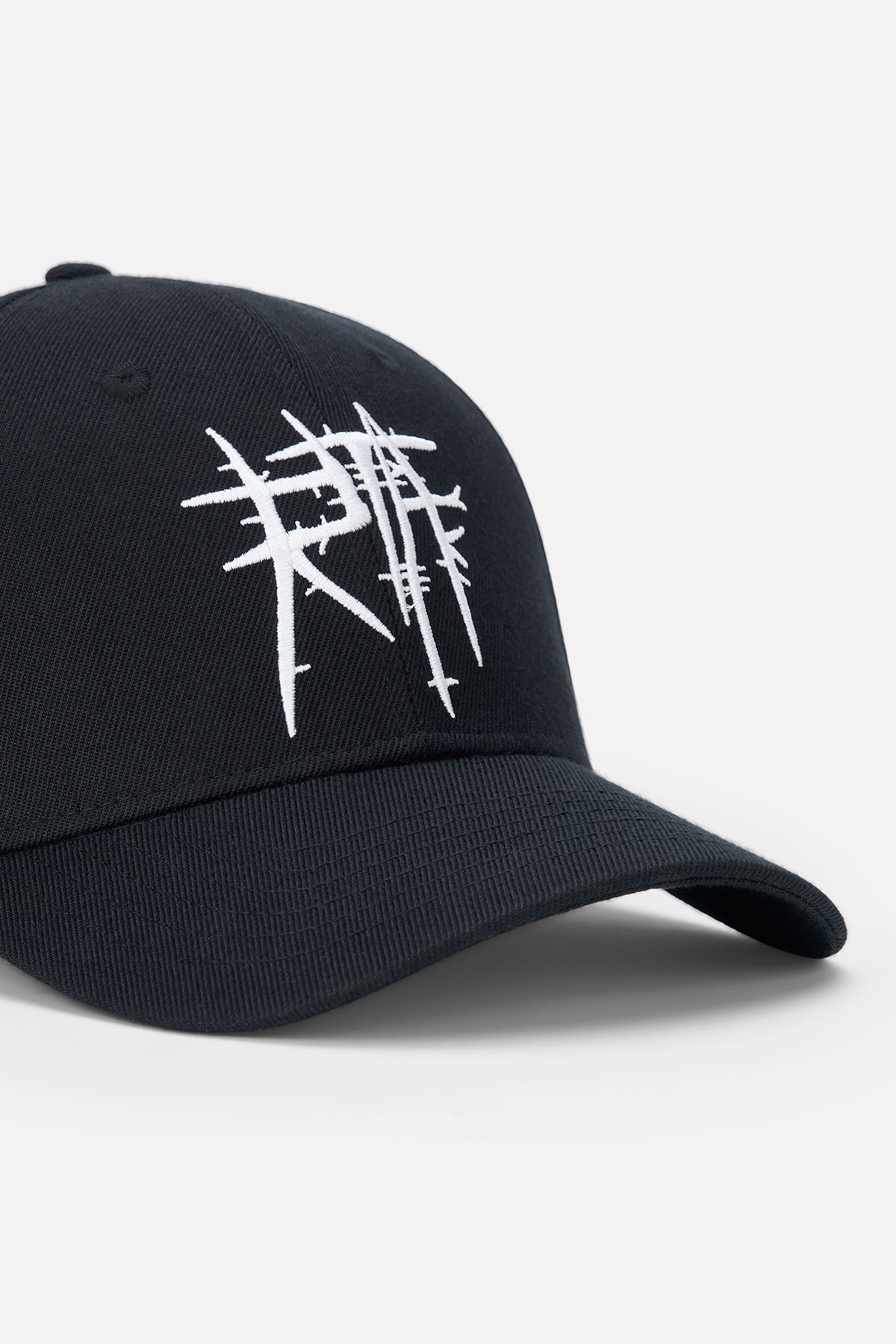 Black Wool Baseball Hat Close Up - Thorn Embroidery Detail | RTA