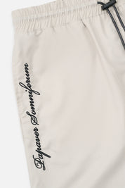 Beige CLYDE Shorts Side Panel - Typography Detail | RTA
