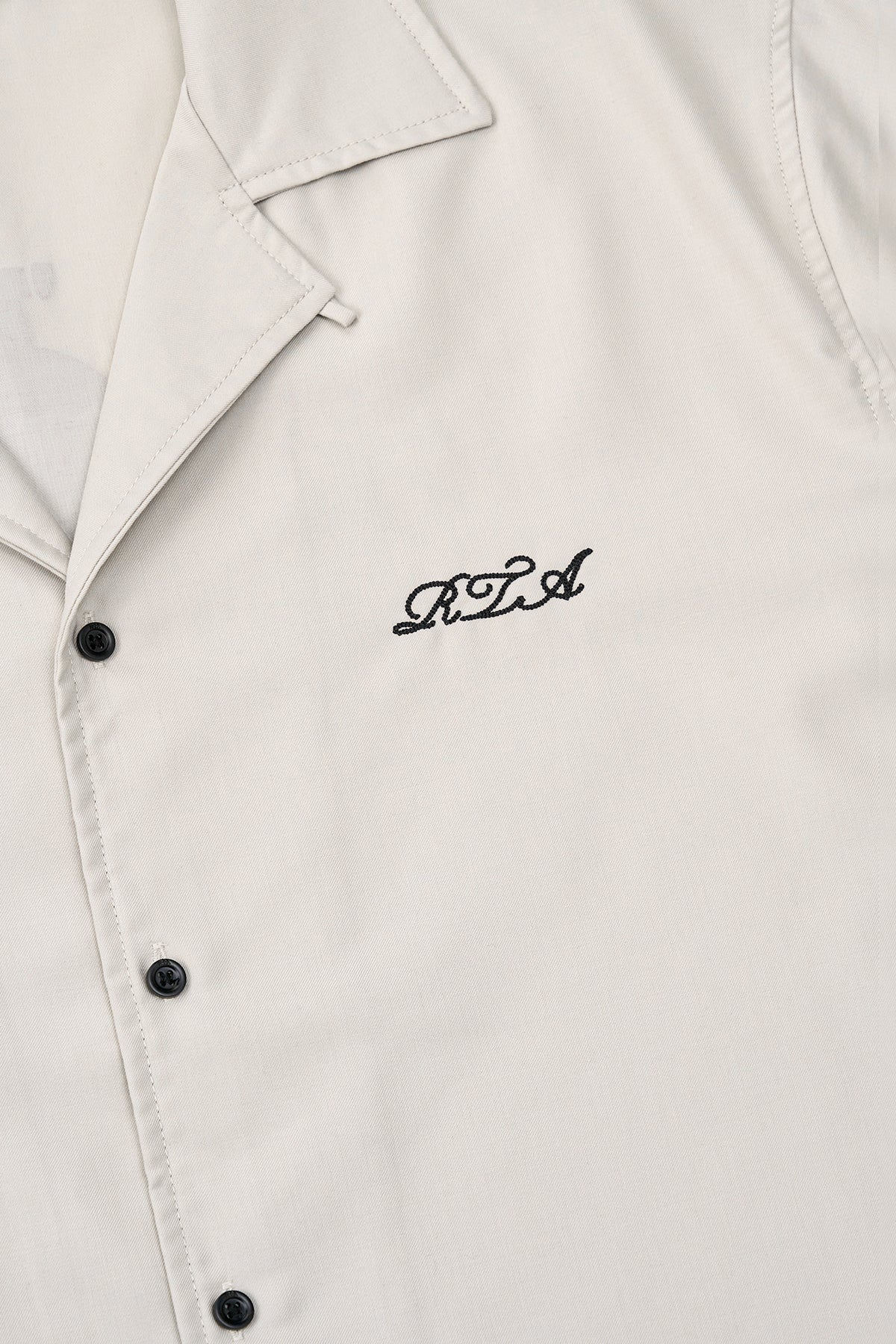Beige Nathan Short Sleeve Shirt - Front Logo Embroidery Close-Up Detail | RTA