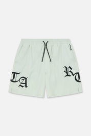 Light Teal Swim Trunks with Old English RTA Branding - Front View | RTA