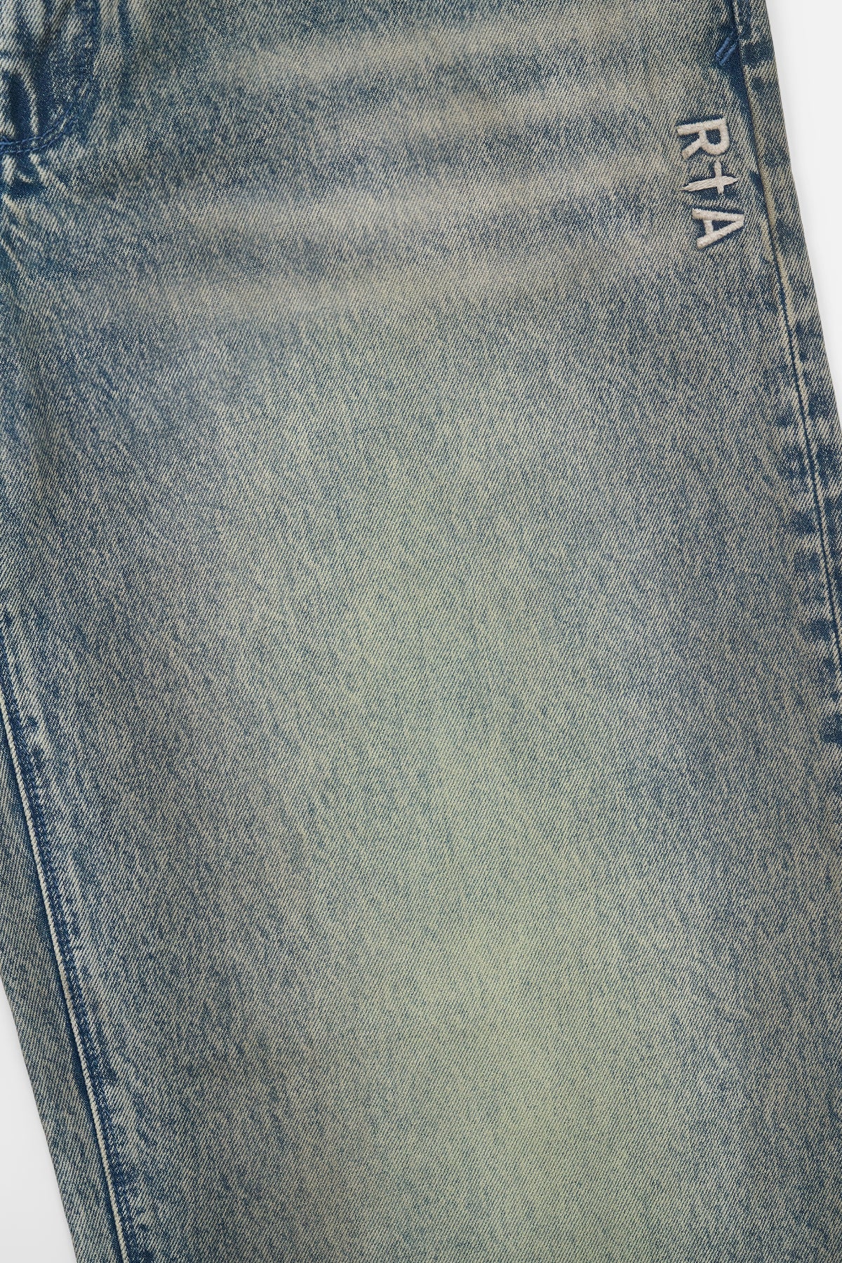 Franco Wide Leg Jean Indigo Jade - RTA Logo Embroidery Close-Up, Faded Indigo Denim Fabric Detail | RTA