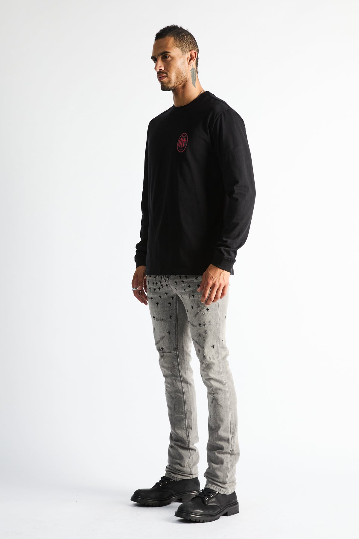 RTA Olivier Stacked Skinny Jean Smoky Rinse Allover Cross - On Model Side Profile View | RTA