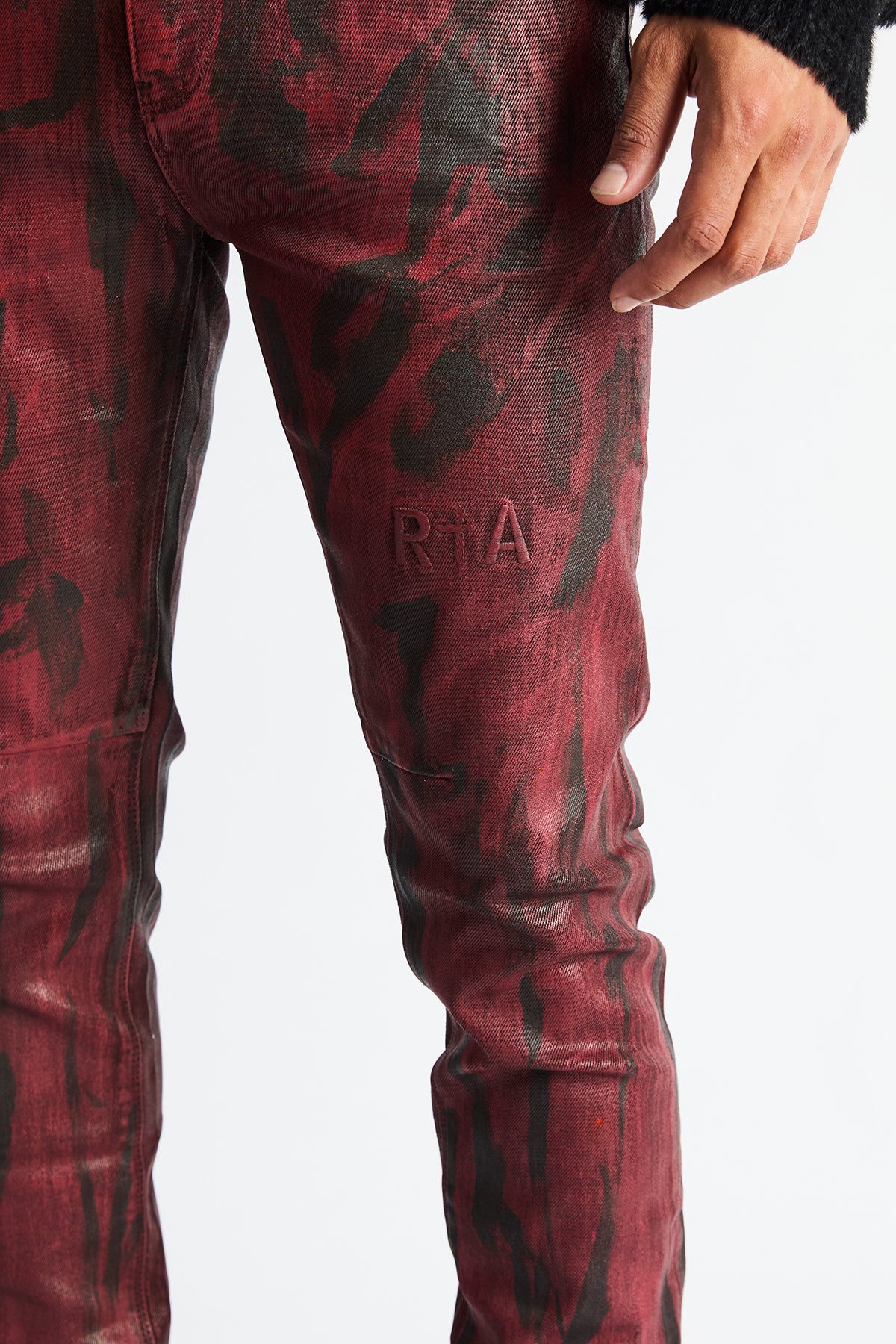 RTA Bryant Skinny Jean Black Eclipse - Signature Logo Embroidery Close-Up, Wax Denim Texture | RTA