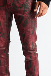RTA Bryant Skinny Jean Black Eclipse - Signature Logo Embroidery Close-Up, Wax Denim Texture | RTA
