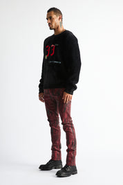 RTA Bryant Skinny Jean Black Eclipse - Red Graphic Wax Denim, On-Model Side Profile | RTA