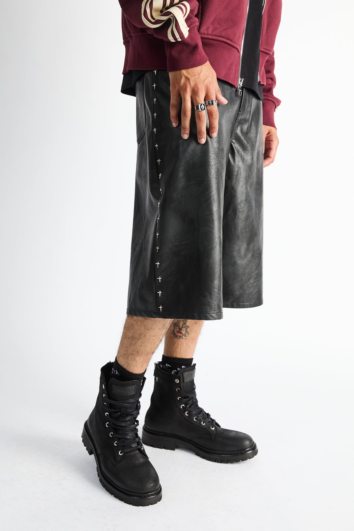 Gustavo Bermuda Shorts Vintage Black - Close-Up Cross Rivet Side Detail, On Model | RTA