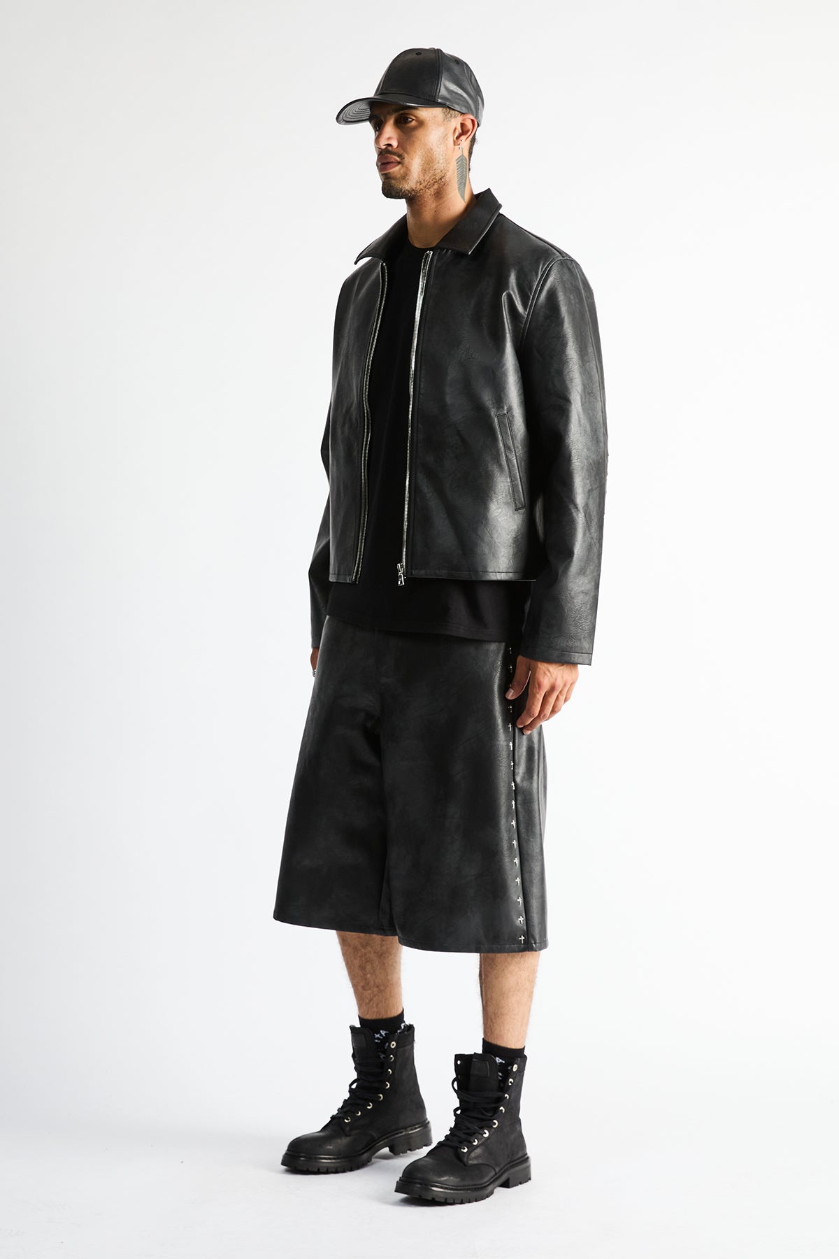 Gustavo Bermuda Shorts Vintage Black - Side Profile Styled Look, Cross Rivet Seam Detail | RTA