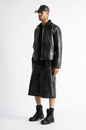 Gustavo Bermuda Shorts Vintage Black - Side Profile Styled Look, Cross Rivet Seam Detail | RTA
