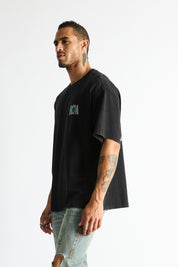 RTA Colin Oversized Tee Vintage Black - On Model Side Profile, Oversized Cotton Streetwear Silhouette | RTA