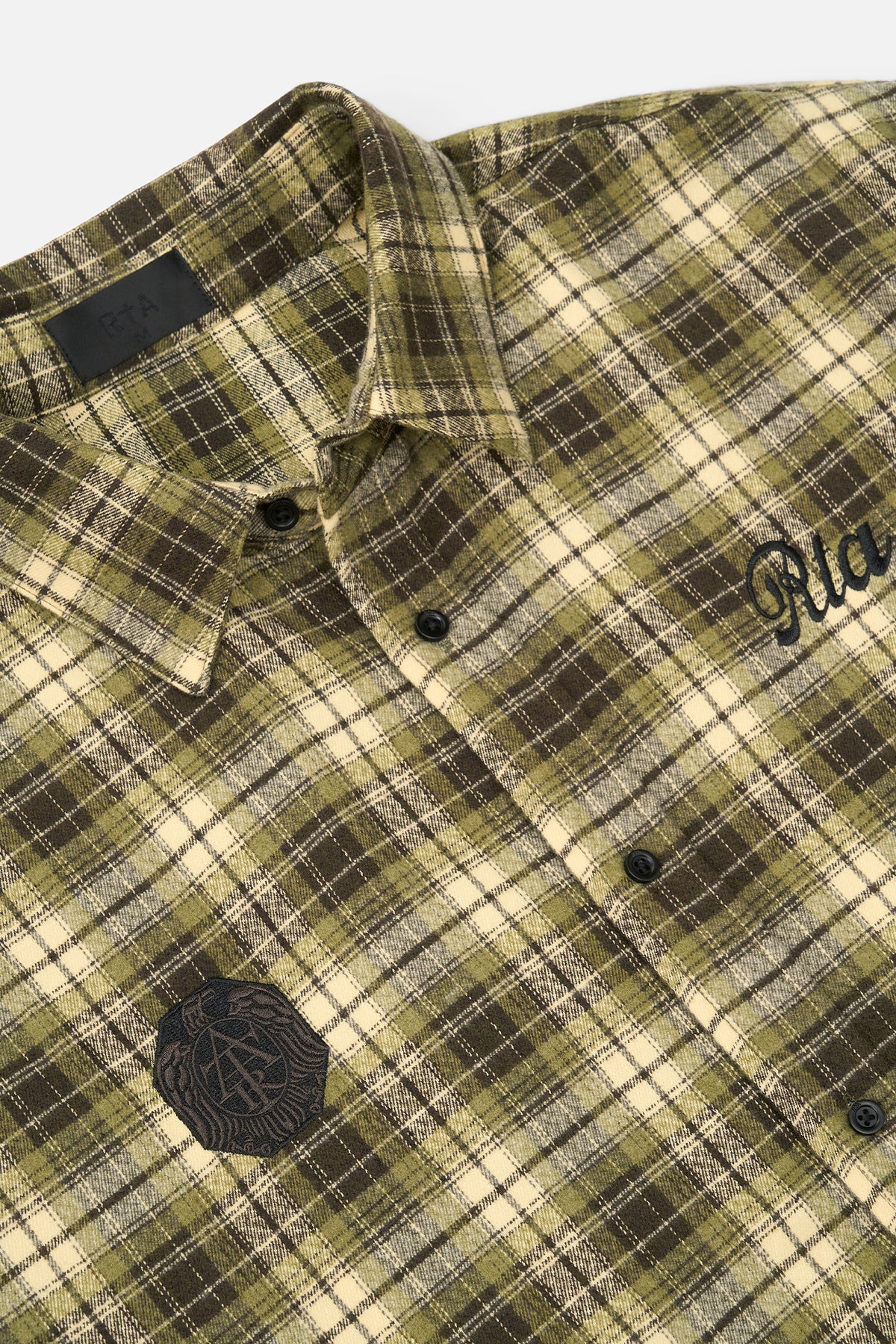 RTA Rynor Cropped Button Up Shirt Olive Plaid - Close-Up, RTA Logo Embroidery and Signature Crest Patch Detail | RTA