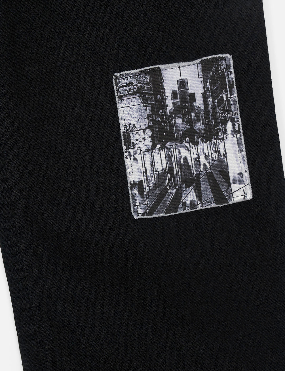 Black Rex Jean Embroidered Patch Detail - Close Up View | RTA
