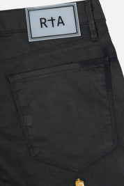 Black Denim Skinny Jean Back Pocket and Brand Label Close-Up Detail | RTA